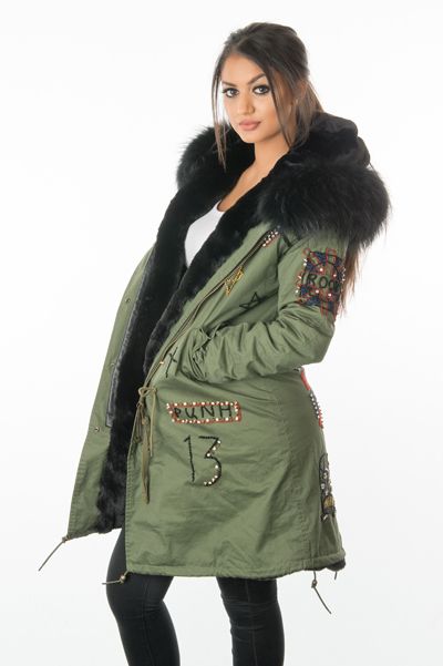 stonetail badged and braided fur parka coat front side view